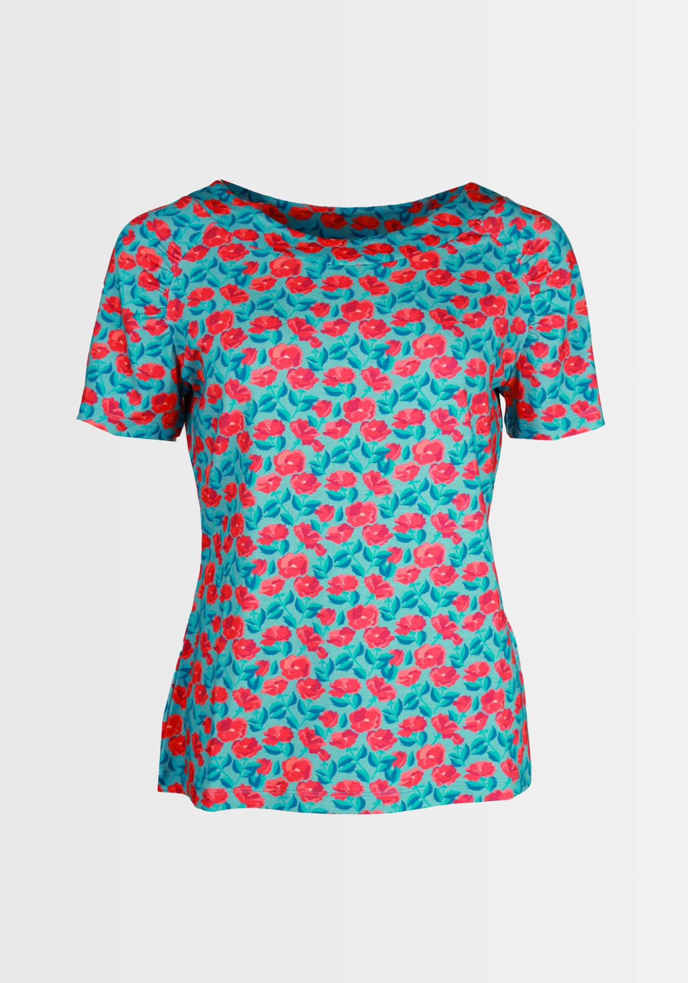 Detailansicht des floralen Prints auf dem „Zoe rosy“ Shirt in Türkis. Die dezenten Blumenmotive in Rosatönen sind liebevoll arrangiert und machen das Oberteil zu einem frischen Hingucker.