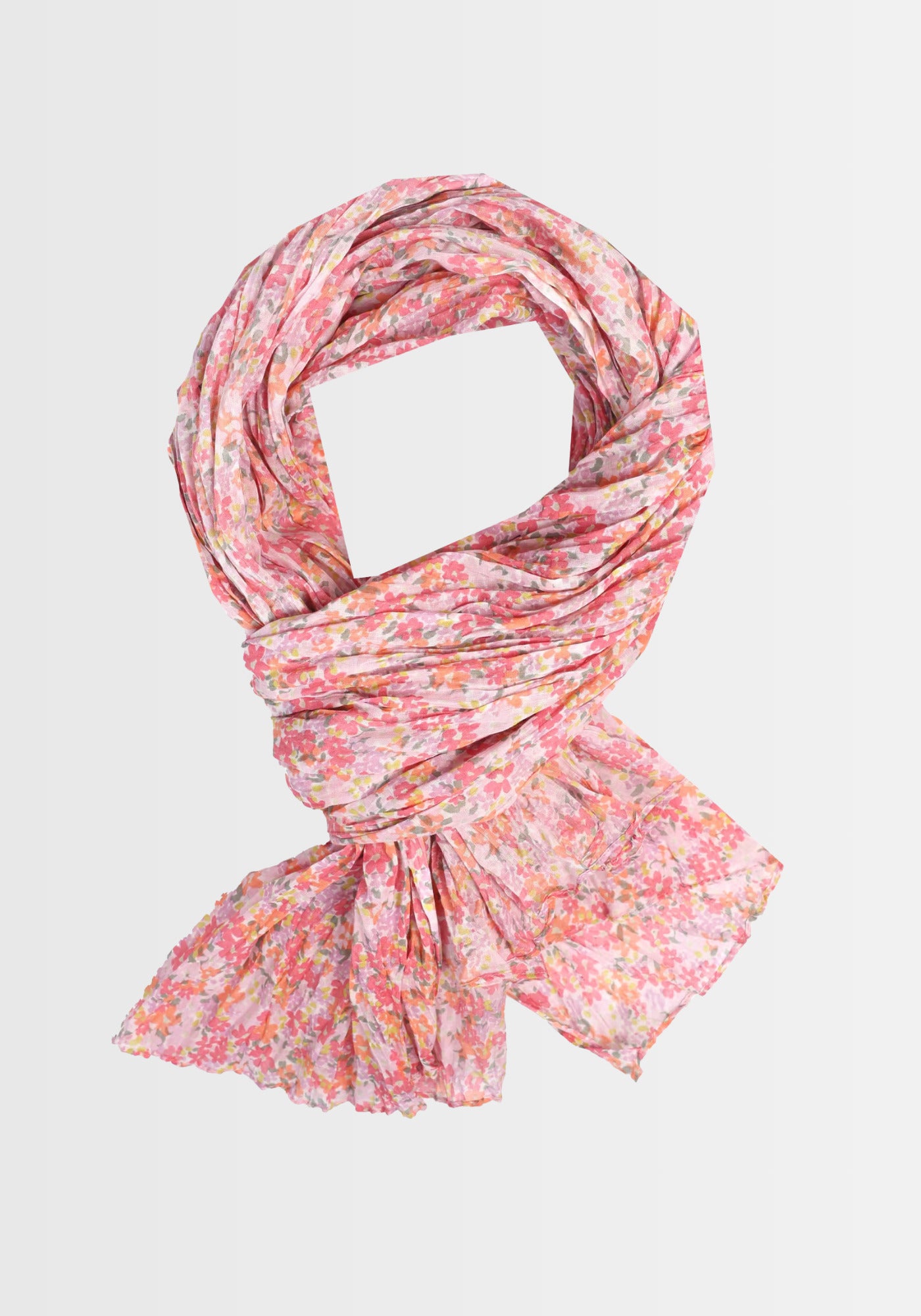 Freigestellte Ansicht des Tuchs „Inesse – rose“ in zarten Rosatönen, gefertigt aus 100% Bio-Baumwolle. Der exklusive florale Druck und der harmonische Farbverlauf machen diesen Schal zum idealen, vielseitig kombinierbaren Accessoire.